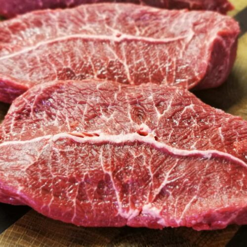 Fresh Feather Blade Steak from The Farmers Butcher, available as 8oz steaks or whole pieces for slow cooking.